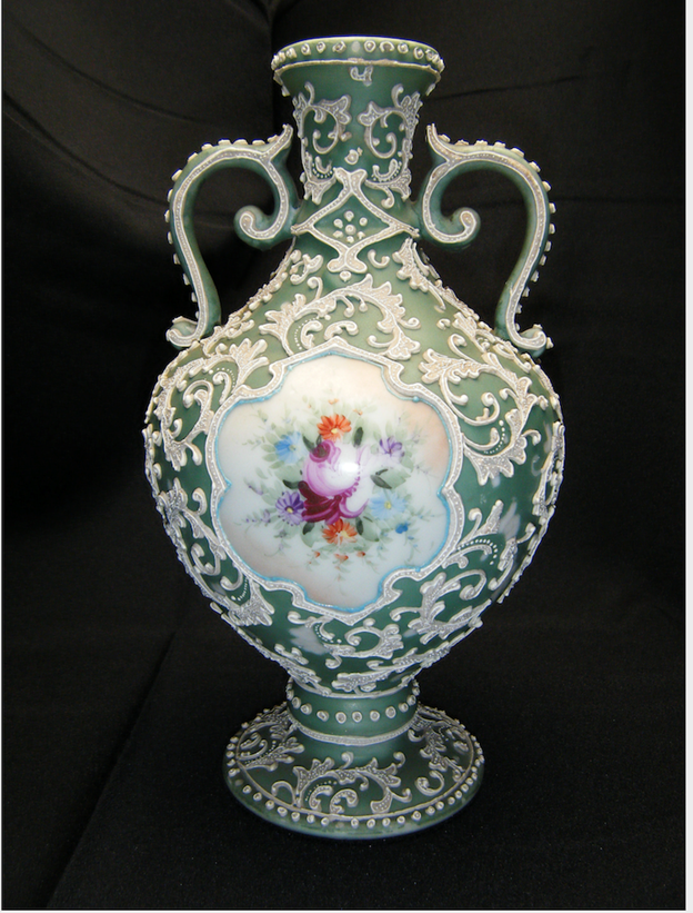 Antique Japanese Moriage Vase A green vase with flowers on it